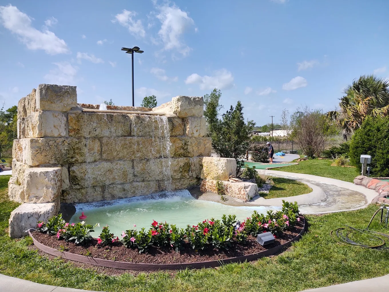 Signature stone waterfall feature on the Longview Greens course